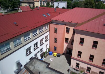 Na fasádě byly použity cementovláknité desky od výrobce Silbonit.